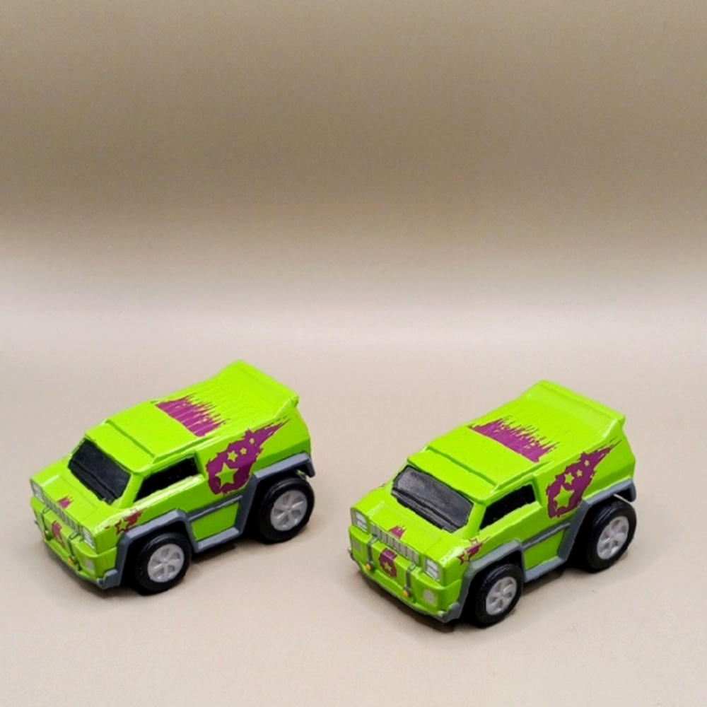 Green and Purple Toy Cars